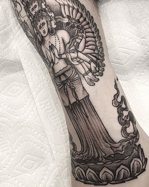 Fine line and dotwork black and grey shiva statue tattoo done by tattoo artist Alan Lott of Sacred Mandala Studio in Durham, NC.